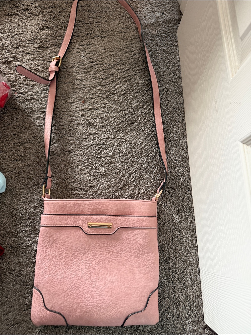 Sleek Pink Crossbody Bag with Adjustable Strap